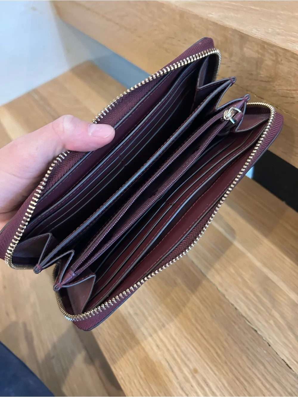 NWOT Kate Spade burgundy zip-around pebbled leather wallet